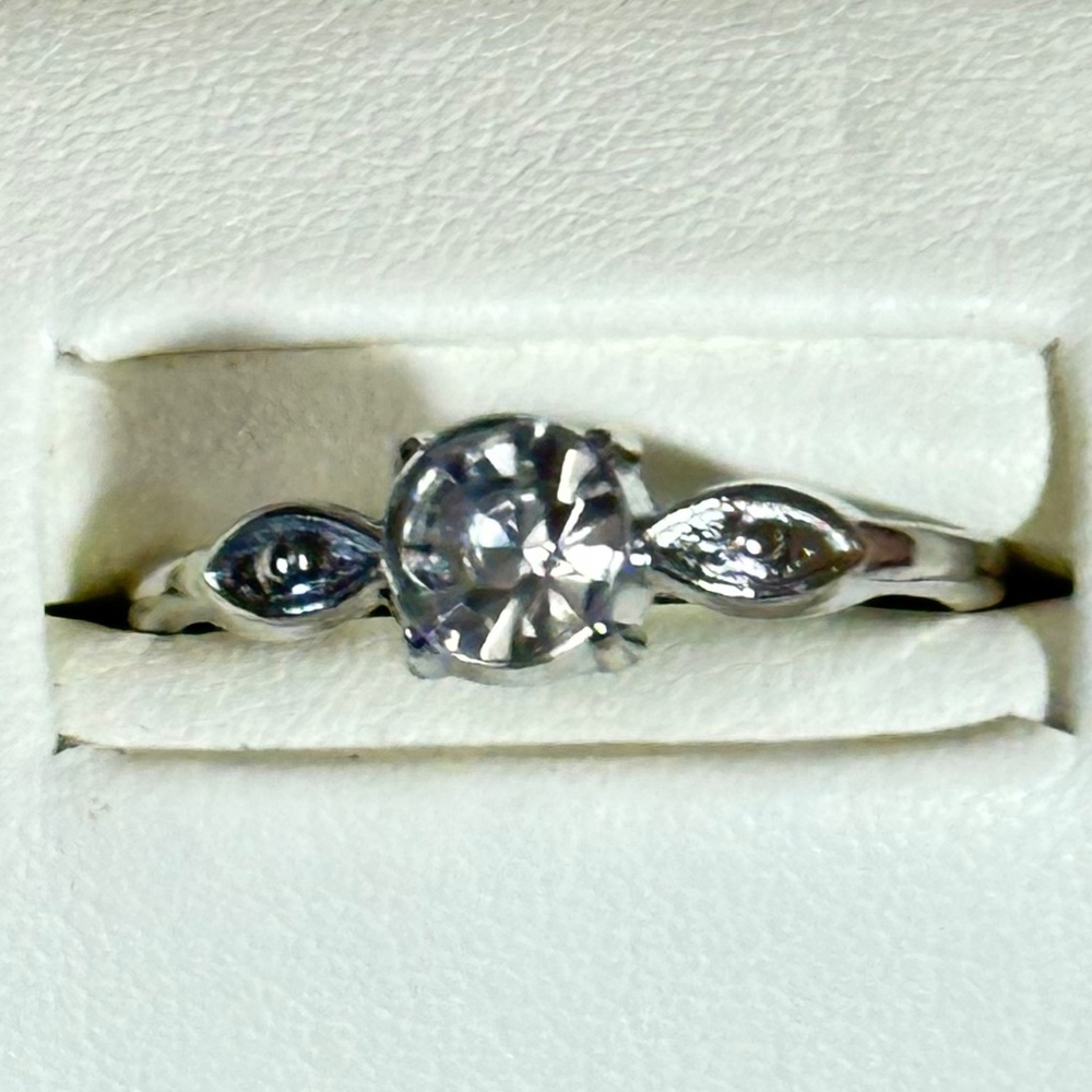 Silver tone ring w/round lab created diamond & 2 clear round CZ’s on sides